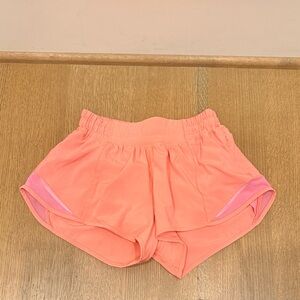 Lululemon Hotty Hot 2.5 inch shorts in cute bright coral pink shorts
